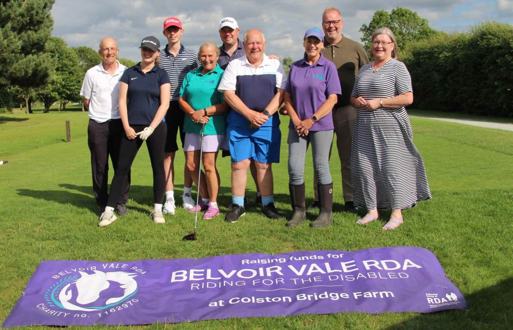The golf team out on the course raising money